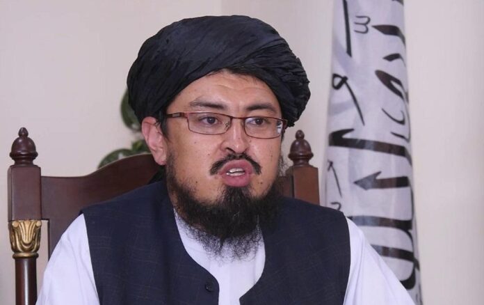 Afghan taliban warn of reviewing policy if US