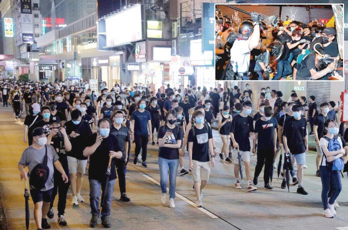 ہانگ کانگ: ملزمان کی چین کو حوالگی کے متنازع قانون کے خلاف احتجاج میں مظاہرین اور پولیس میں جھڑپ ہو رہی ہے