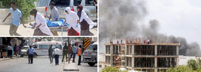 موغادیشو: چیک پوسٹ پر کار بم حملے کے بعد دھواں اٹھ رہا ہے‘ نرسیں اور شہری زخمی کو اسپتال منتقل کررہے ہیں